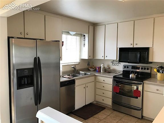 Stainless Steel Appliances in Kitchen with 42 " Cabinets For Lots of Storage.