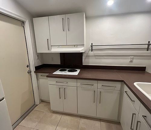 5th image of 100 NE 43rd St Unit 1-3