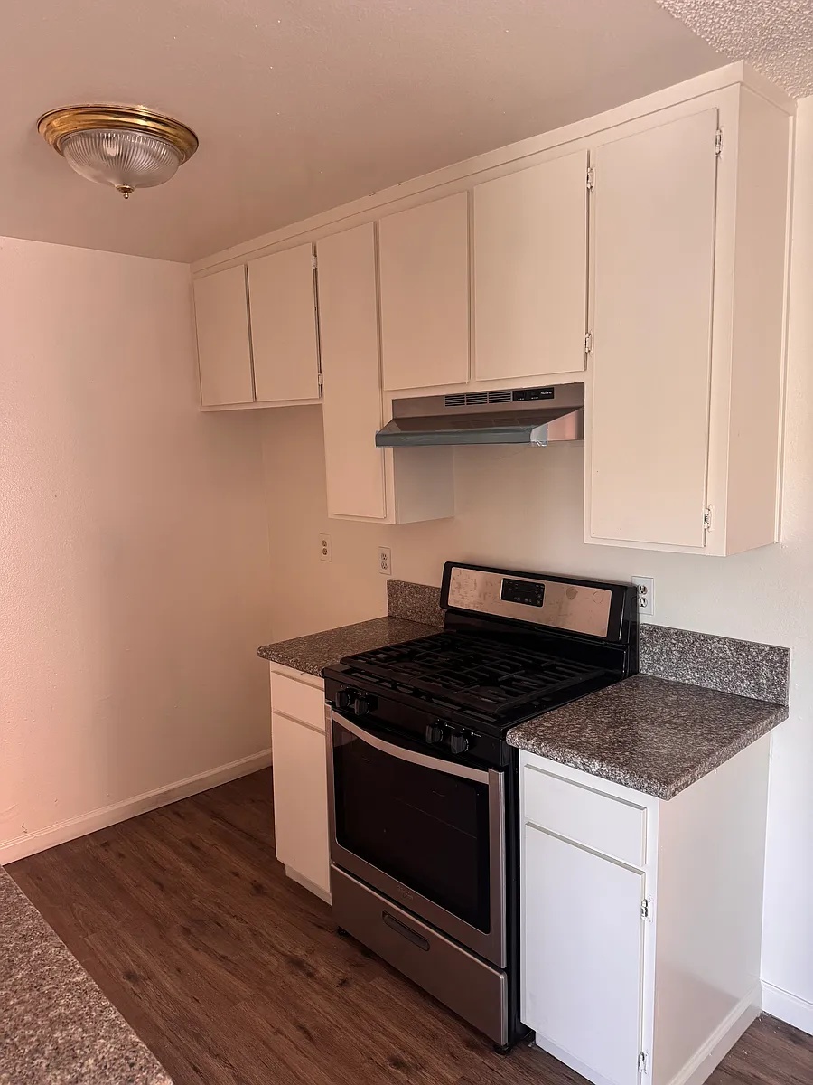 Kitchen with gas range and counter space - 1700 Pomeroy Ave #306