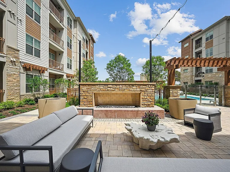 Gather with friends and neighbors around our cozy outdoor fire pit.