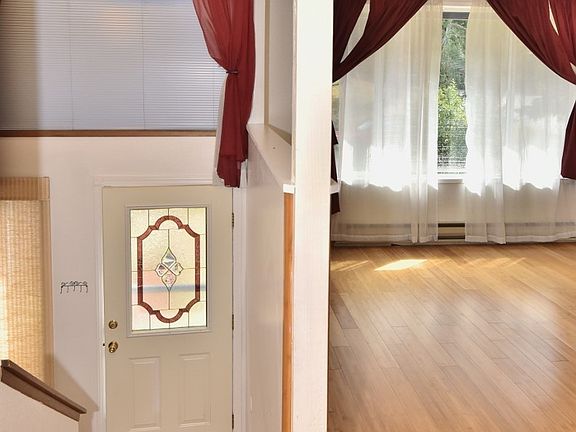 Bamboo flooring throughout Foyer, Stairs, Living room, Dining room