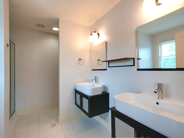 primary bath has two vanities