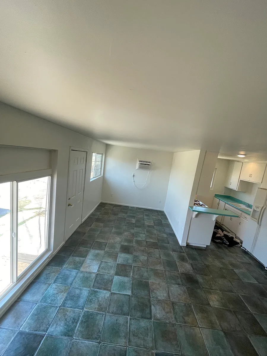 Dining and Kitchen, notice wall A/C - 13243 Davenport St #4