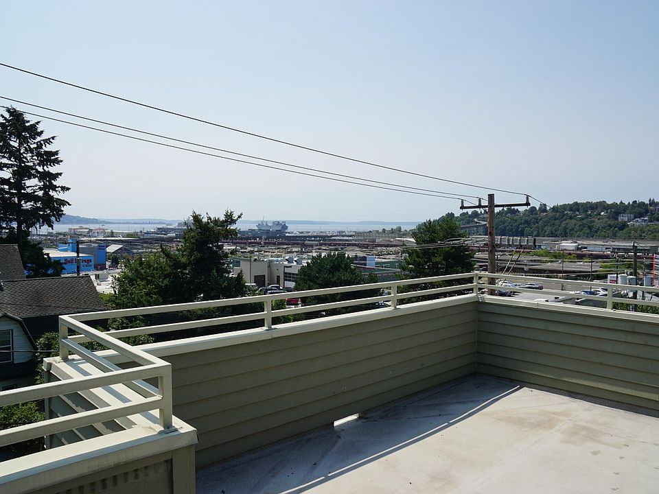 roof top deck with views of The Olympics and Puget Sound. Its fun watching cruise ships and ferries come in.