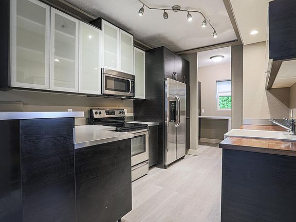 Updated kitchen with stainless steel appliances