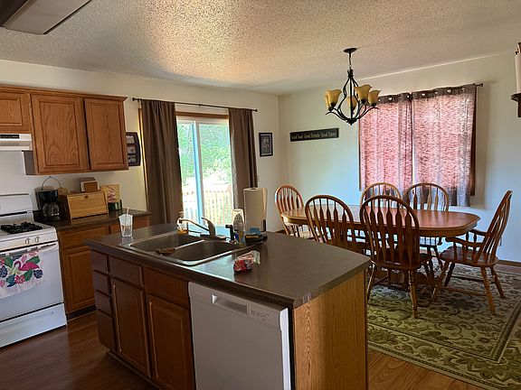 Kitchen and dining room, sliding glass doors to deck