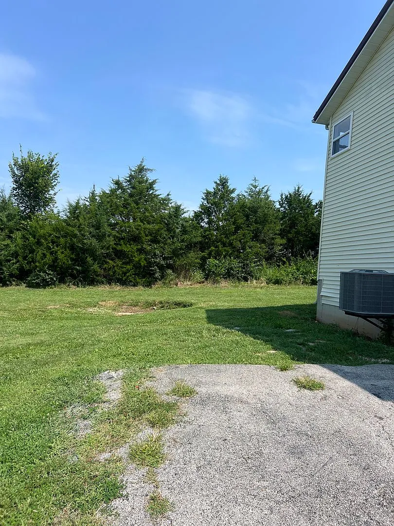 4 beds 1.5 baths on 1/2 acre lot — Photo 3