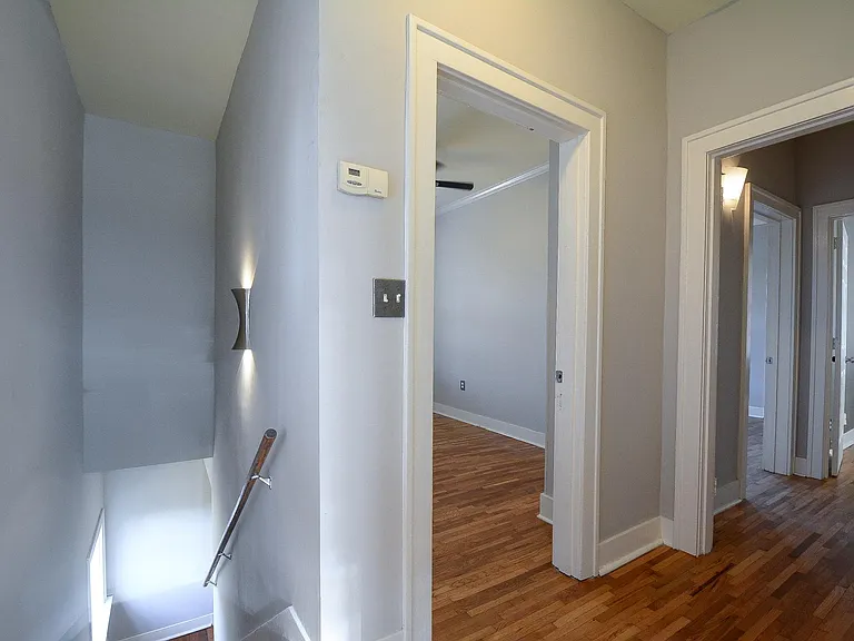 Staircase down and smallest bedroom/office