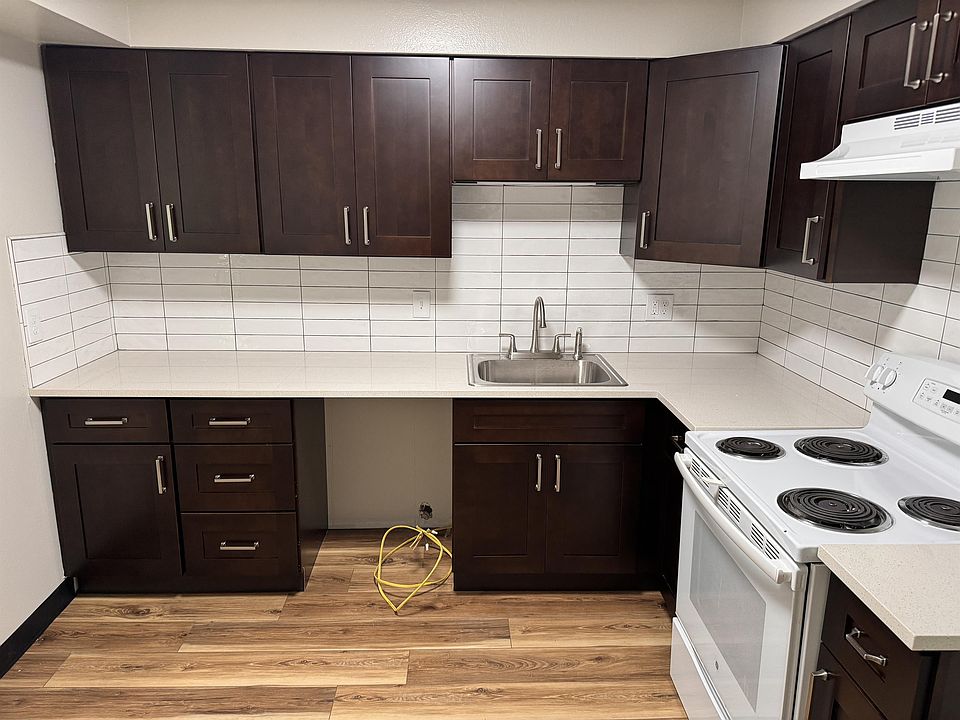 Brand new Kitchen remodel.
large double sink and crystal stone counter tops.