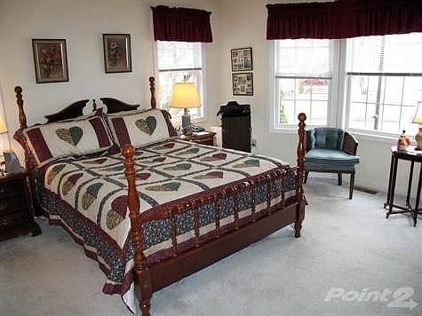 The Master Bedroom has also been repainted and features an ensuite bath and walk-in closet.