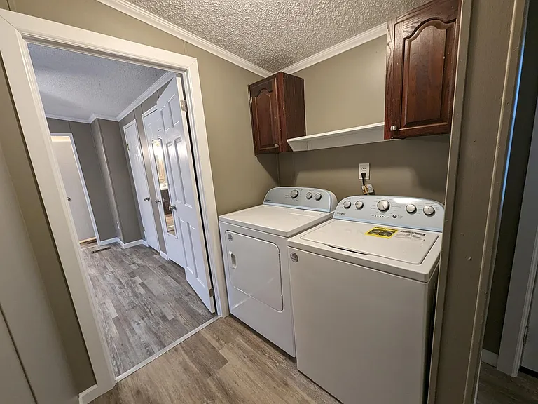 washer dryer with cabinets above