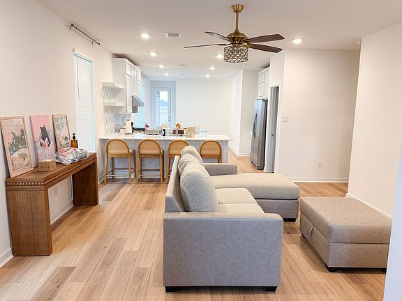 Open concept living room, kitchen, dining