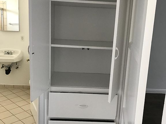 Hallway with built in cabinets
