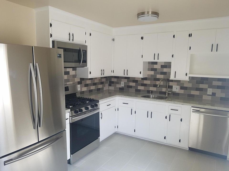 Beautifully appointed kitchen. New flooring, granite counter