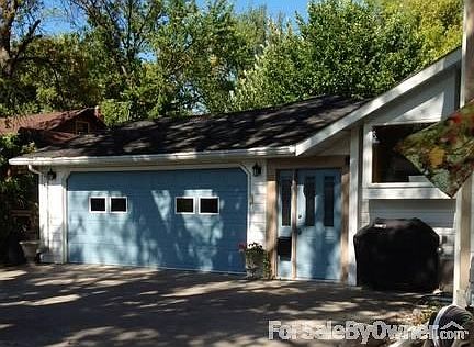 4 stall garage faces south