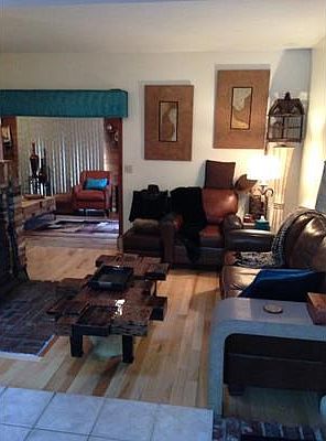 Den with wood burning stove