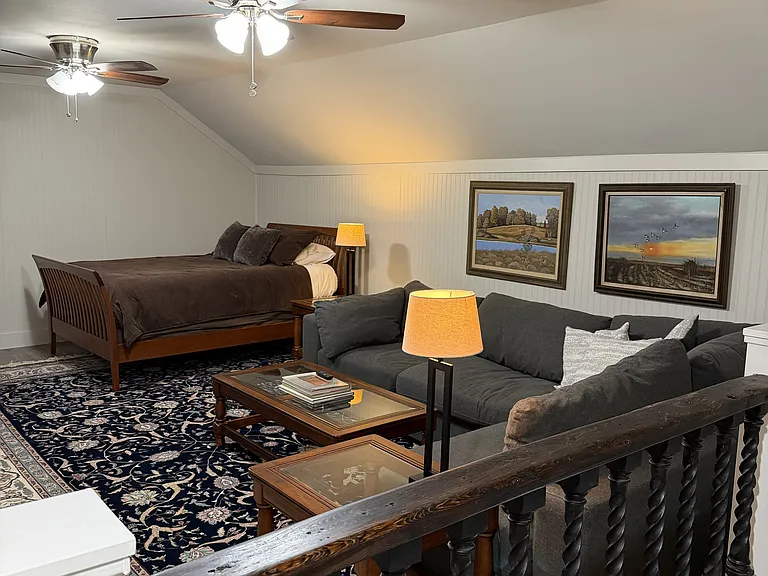 Upstairs has a Queen Bed and a sectional Sofa. There is also a 58" Smart TV with Starlink internet.