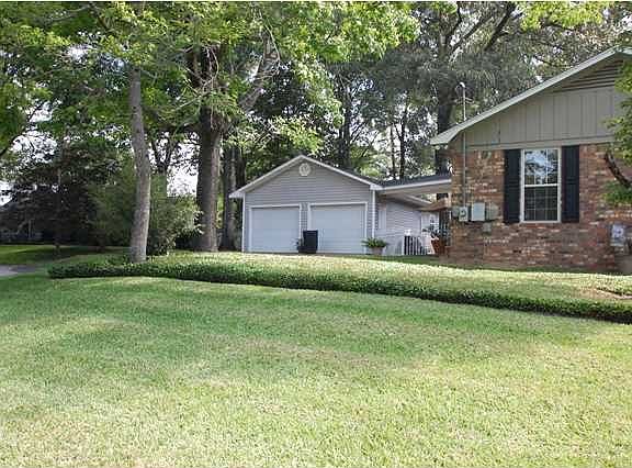 Side view + detached garage
