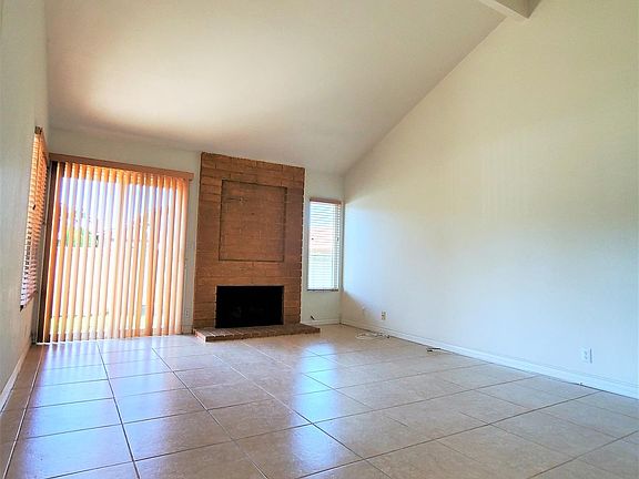 Formal living room with high vaulted ceiling