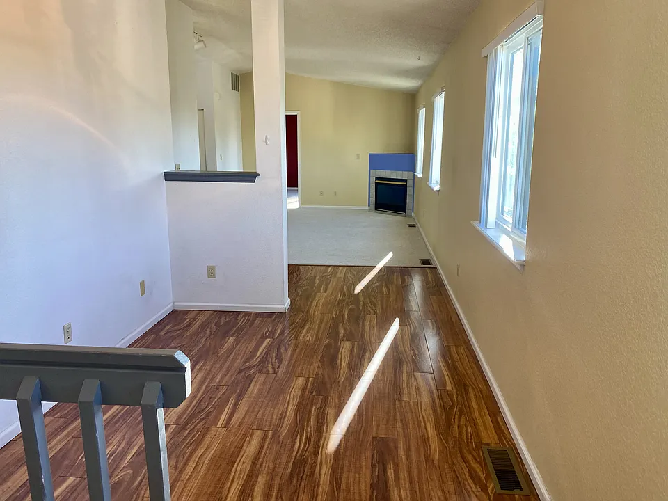 Open floor plan with tons of natural light and views of the foothills.
