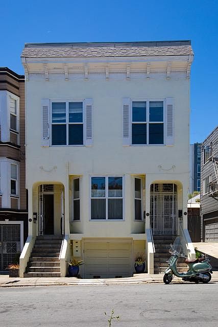 3-unit Victorian Building. #24 Pond private front entry door is accessed using the left-side staircase. #20 and #22 Pond flats are accessed using the right-side staircase