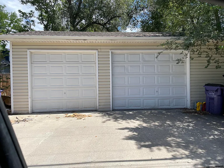 2 car oversized garage. Upper unit is garage door to the right.