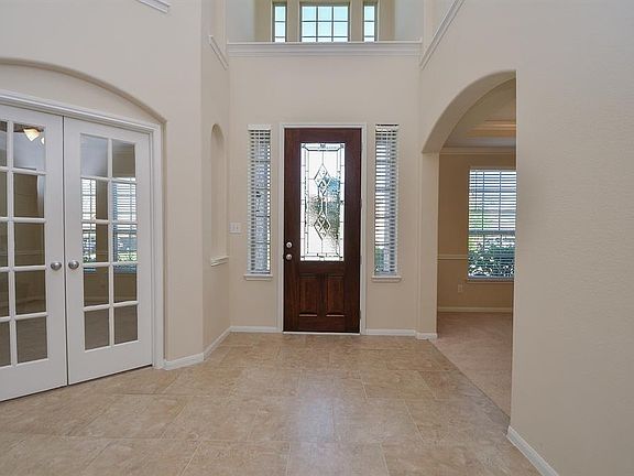 The sunlight floods into this beautiful entry! With a gorgeous glass door and sidelight windowsâyouâll be proud to welcome your guests into this cheerful foyer.