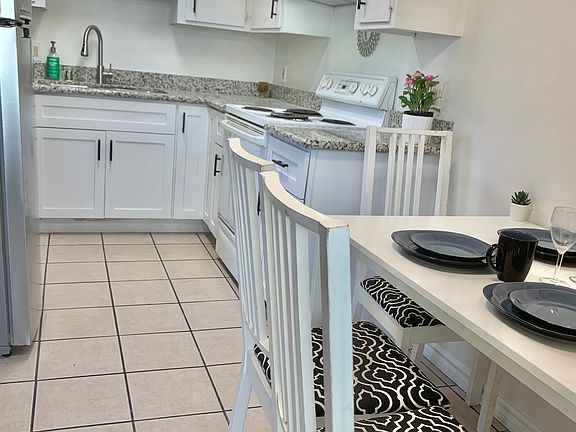 upgraded kitchen with granite counter top