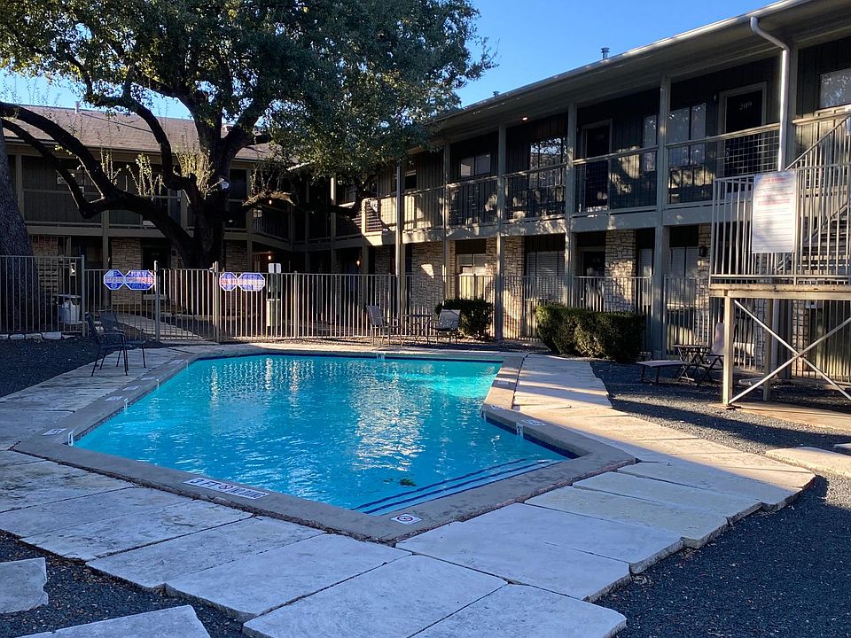 Condo is at the top of the stairs by the pool on the right