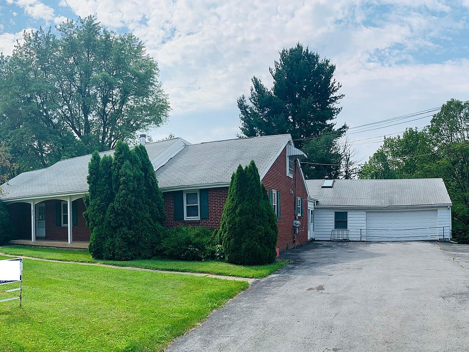 Front of house, yard and driveway