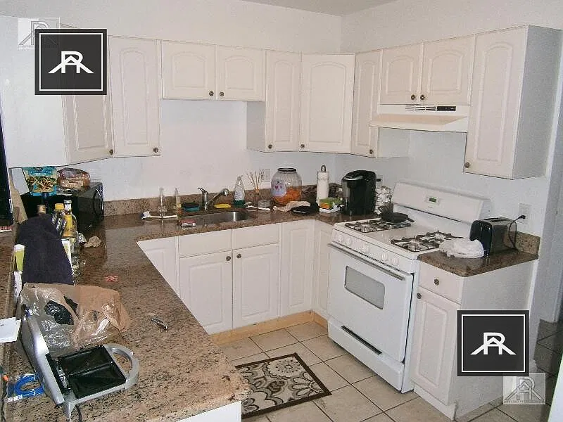 4 bed, 1.0 bath, $5,400 — Photo 1