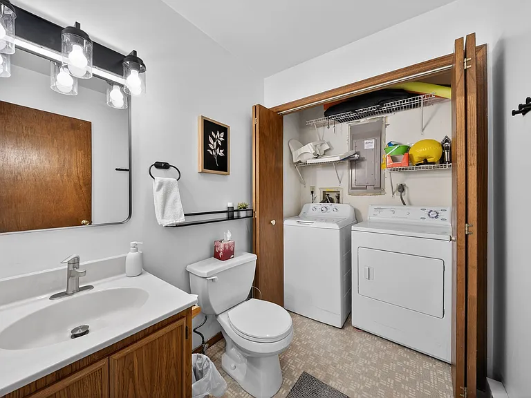 Enjoy a first-floor full bathroom and dedicated laundry area, making day-to-day living easy and comfortable.