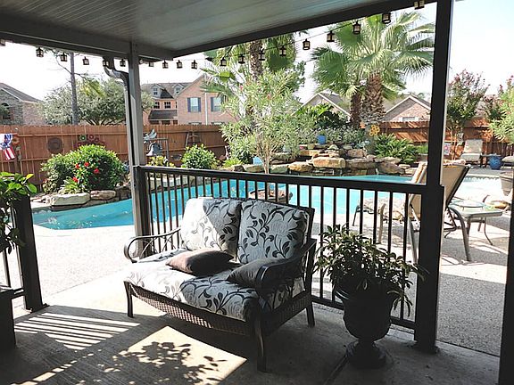 SUN SHADE...covered patio will be a cool, shady retreat..features a fireplace too for year round enj