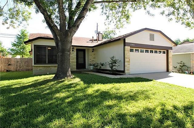 Excellent Street Appeal with Towering front-yard Tree