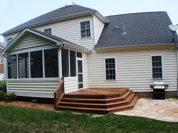 Back with slate patio & deck