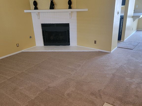 Large living room with gas fireplace