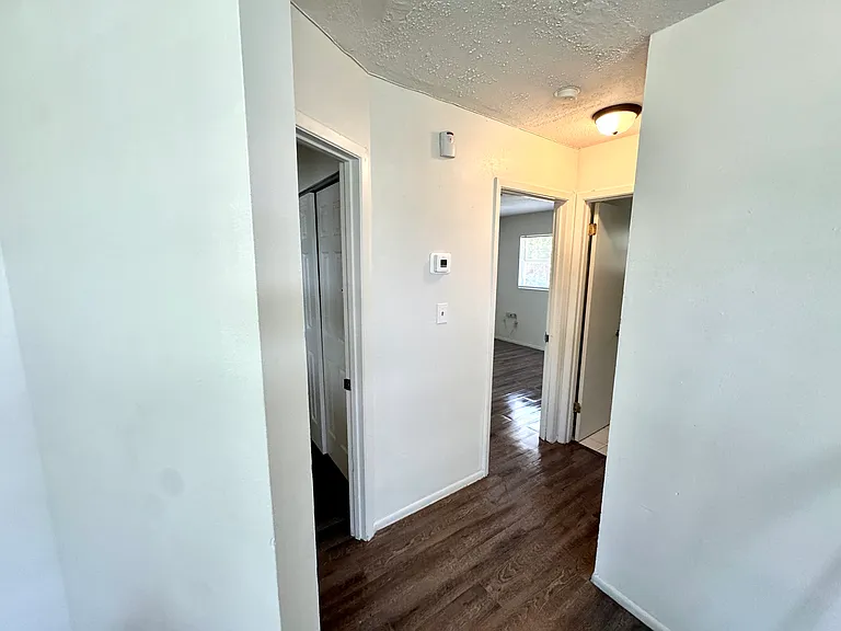 Interior photos are of a neighboring unit with identical floor plan. Paint color is the same, but the flooring is actually ceramic tile.