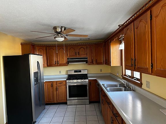 Kitchen, all stainless, brand new dishwasher, newer stove, fridge with water and ice breakfast bar