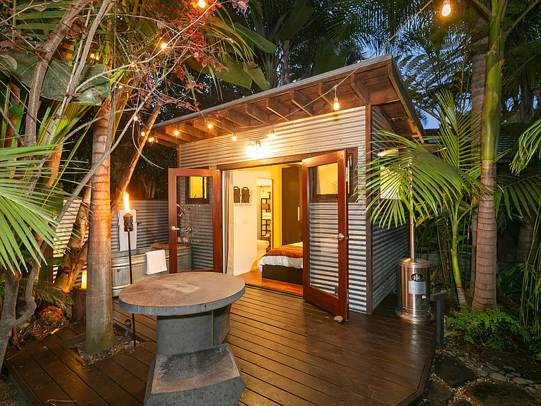 Detached bedroom contained within enclosed back yard, has it's own deck, Queen bed or can be an office, has it's own bathroom