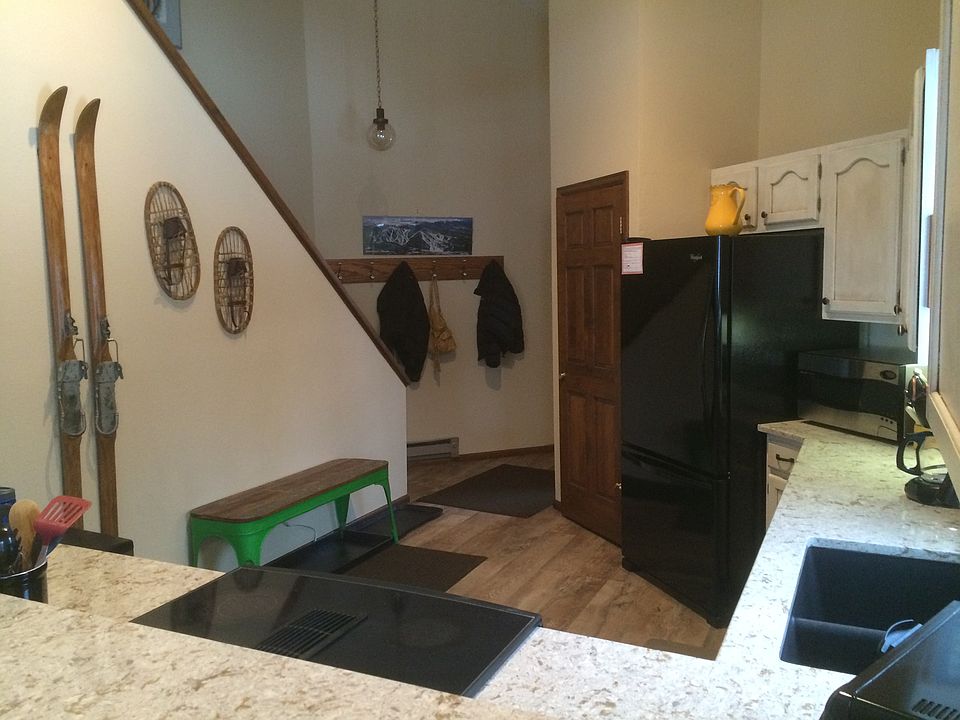 Kitchen, entry and stairs to second floor.