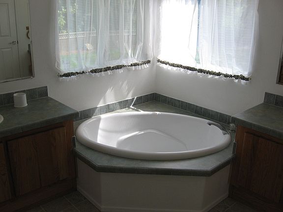 Large corner tub in master