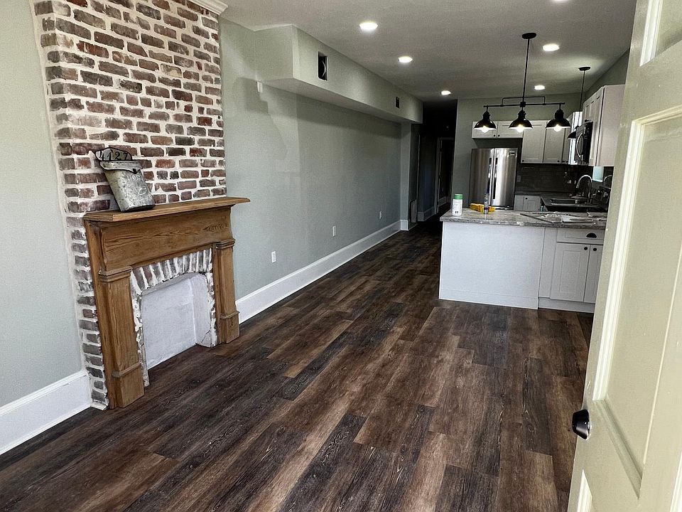 Your great room for you and your family and friends. Peninsula with a bar.