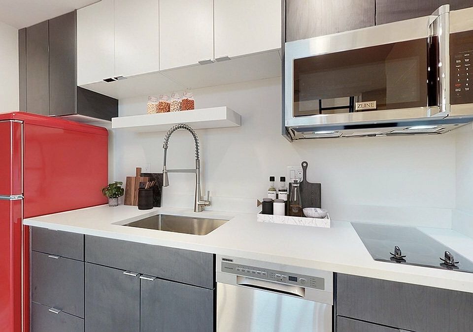 Sleek Kitchen with High-End Appliances and Bold Design