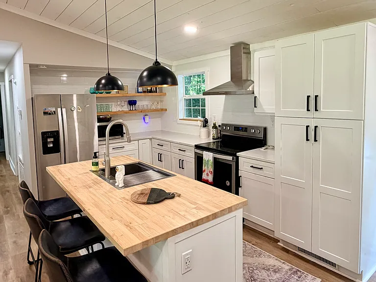 Open floorplan . Kitchen opens to great room and dining area
