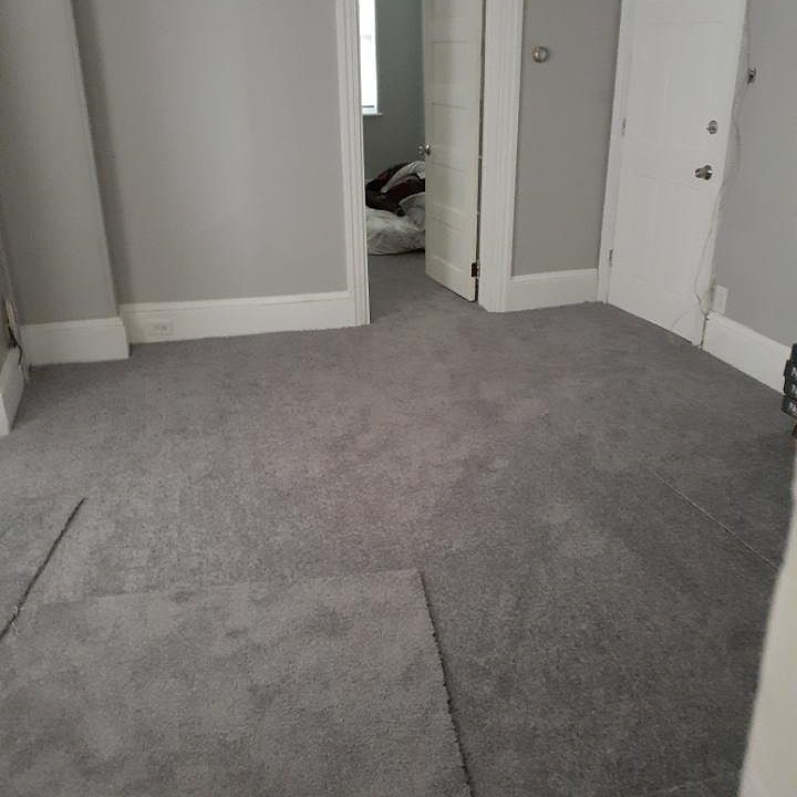 Large living Room - leads to Bedroom 2 one one side and kitchen on the other side.