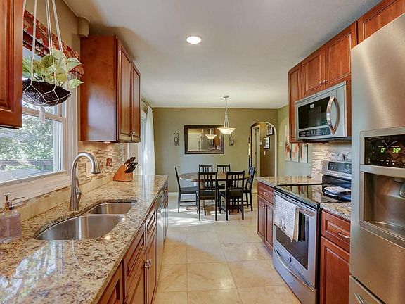 3rd image of 5831 Aquila Ave N