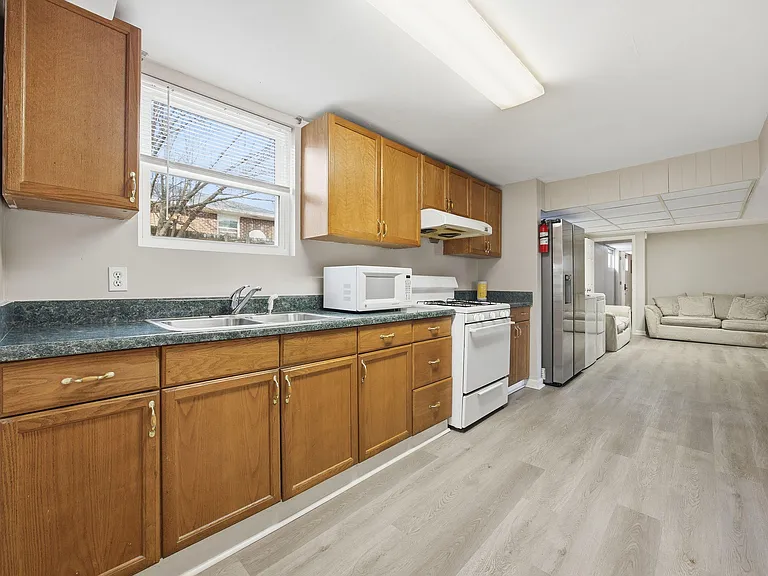 basement kitchen/common area