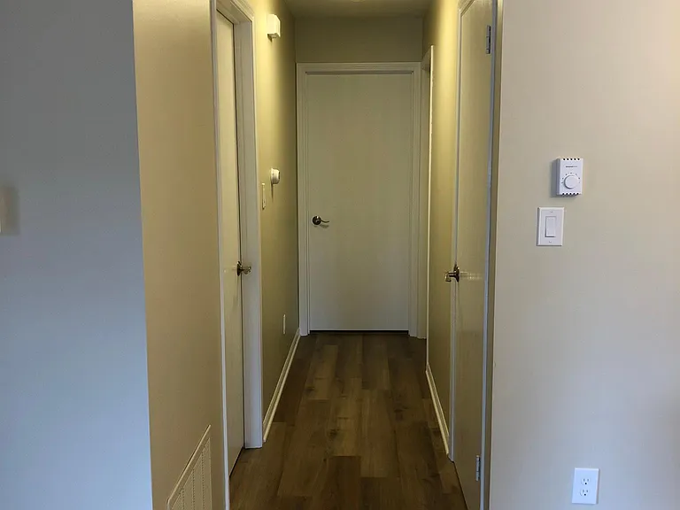 Hallway leading to bedrooms and laundry room