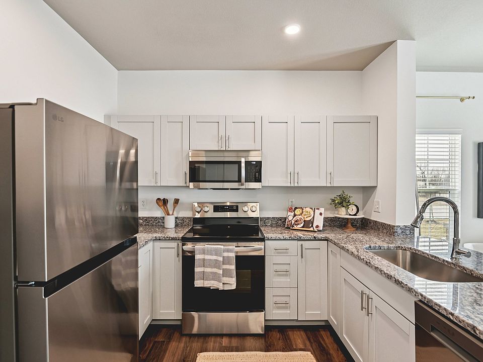 Modern stainless steel appliances and high-end finishes are standard at Westgate on Third.