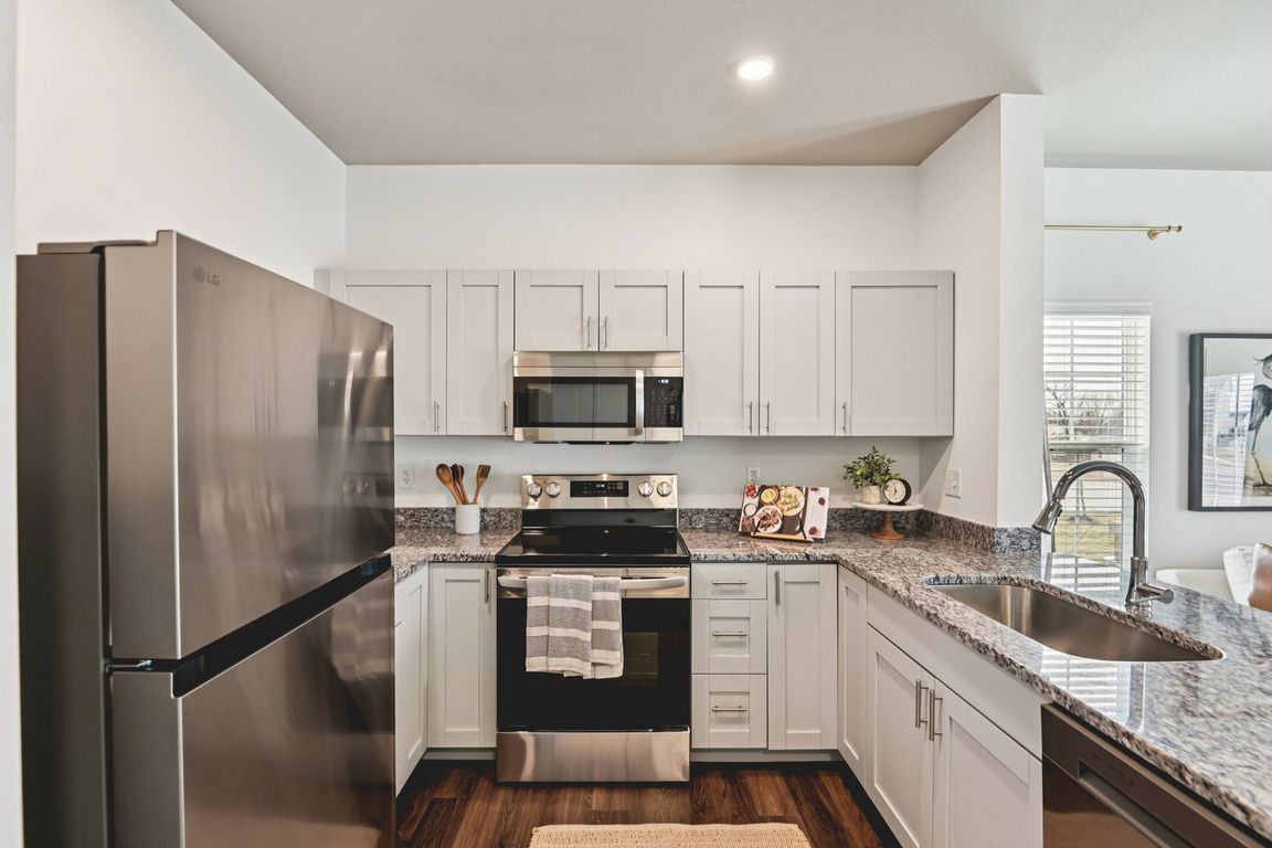 Modern stainless steel appliances and high-end finishes are standard at Westgate on Third.